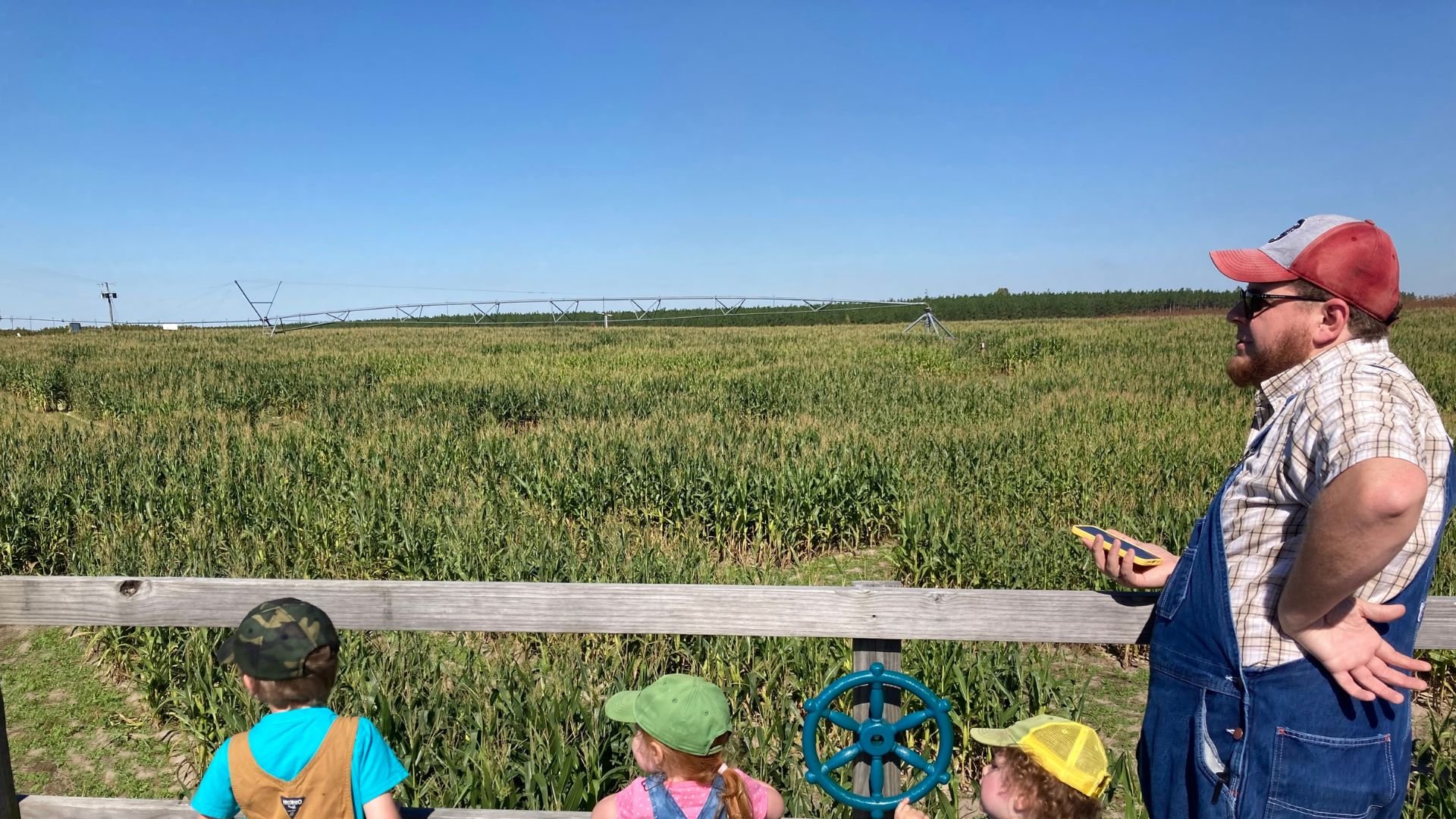 jacob showing kids the agricultural fields of SC Midlands