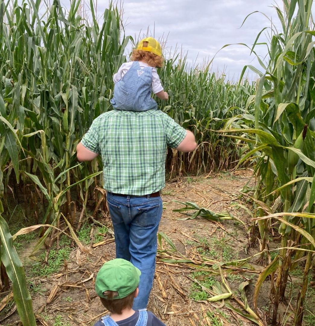 Jacob walking with his kids the South Carolina fields